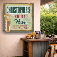 Personalized golf bar sign displayed near an outdoor home bar with golf décor