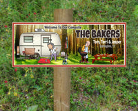 Personalized cartoonish campsite sign with RV, couple, dog, picnic table, and barbecuing scene, featuring editable text