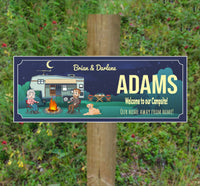 Custom RV camper sign featuring a cartoon couple, campfire, and picnic table with editable text