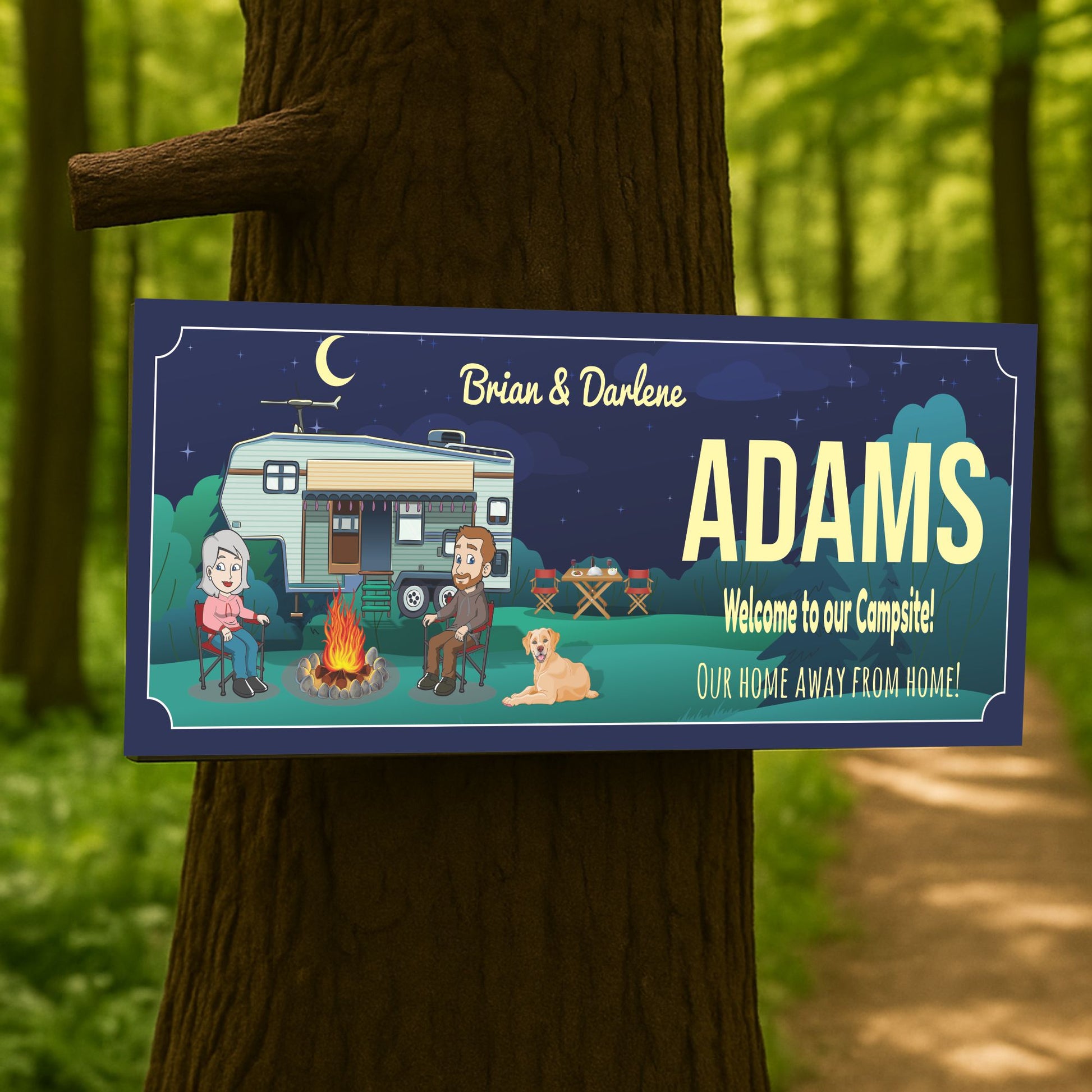 Custom camping sign displayed outdoors on a tree at a campsite