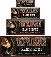 Personalized western sign featuring a cowboy hat, boots, and lasso with editable text