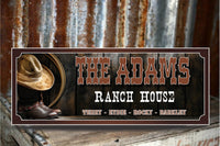 Personalized western sign featuring a cowboy hat, boots, and lasso with editable text