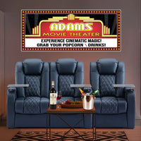 Custom home theater sign designed to look like a vintage movie marquee with faux neon lights and a flashbulb effect border. The sign can be personalized with family names and custom text. It creates a glamorous Tinseltown vibe, perfect for enhancing a home movie room. The sign is also available with a brick background.