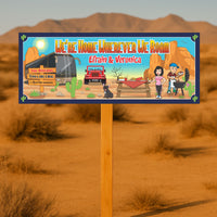 Custom RV camping sign displayed on wooden post in desert campsite