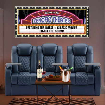 home theater room with recliners and a personalized marquee style sign on the wall