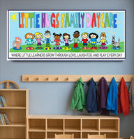 daycare sign with colorful kids and tagline displayed on a classroom wall in a bright childcare setting