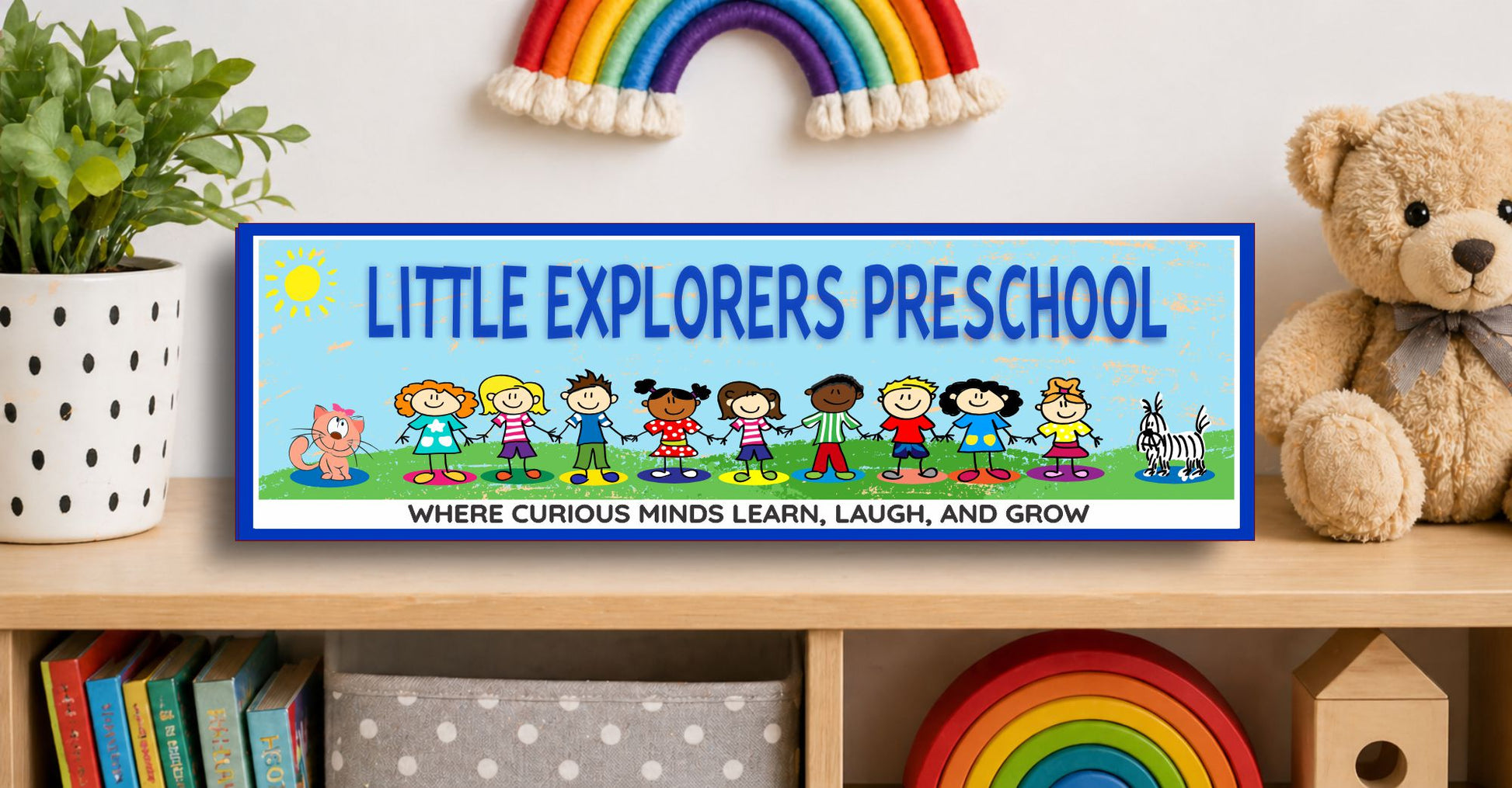 Personalized preschool sign displayed on shelf with rainbow decor in daycare or nursery setting