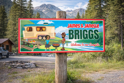 Personalized RV camping sign displayed on a wooden post in a scenic campground setting with mountains and trees.