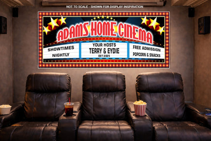 Personalized Adams Home Cinema sign displayed on the wall of a cozy home theater room with leather recliners.