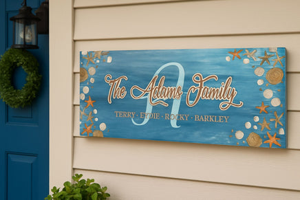 Coastal family name sign mounted on exterior house wall by front door