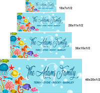 size chart showing four sizes of personalized ocean family name sign with tropical fish design