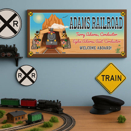 Railroad sign displayed above a toy train setup in a child’s playroom or train room