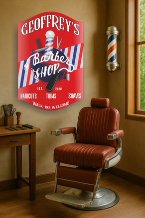 personalized barber shop sign hanging on wall next to vintage barber chair and barber pole in classic barbershop setting