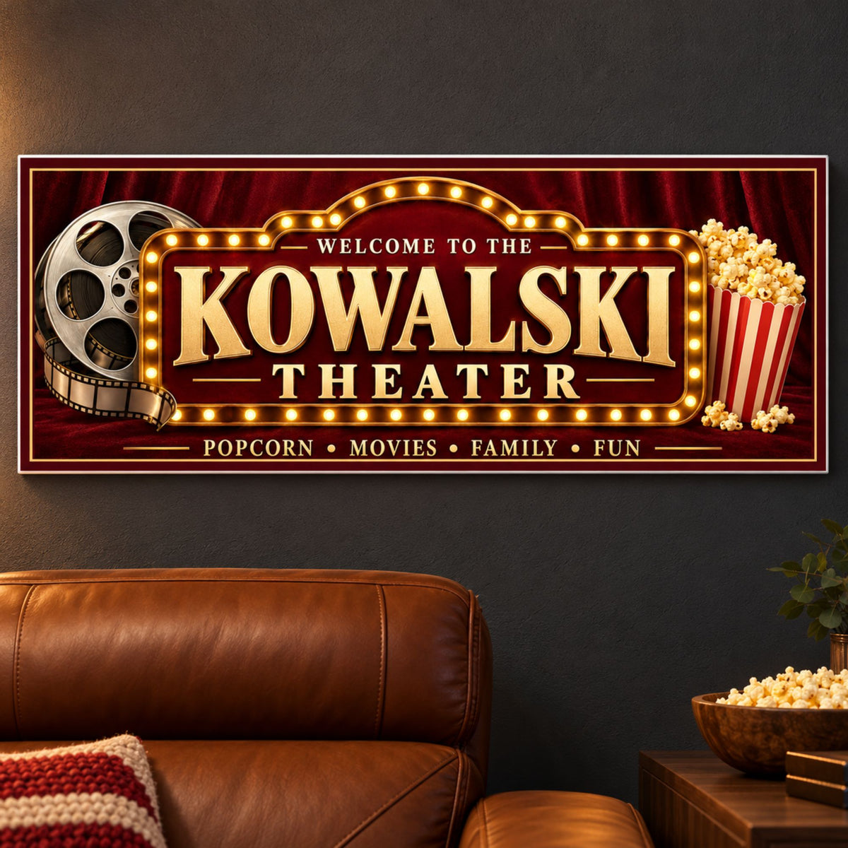 Personalized theater sign mounted on a charcoal wall above a leather chair in a home cinema.