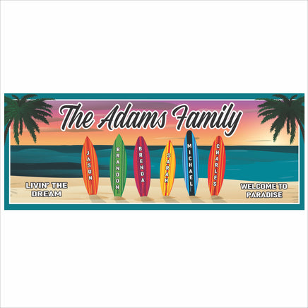 personalized family beach sign with colorful surfboard design and sunset ocean background