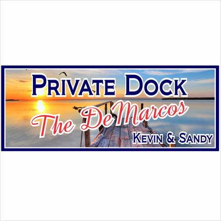 close-up of personalized dock sign featuring sunset water background and editable family name lettering