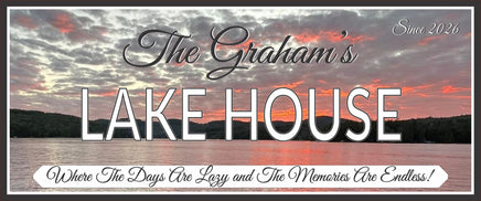 close-up of personalized lake house sign showing sunset art and editable text details