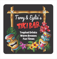 Personalized tiki bar sign with bamboo frame design, colorful tiki masks, tropical flowers, and custom bar name text on a dark background
