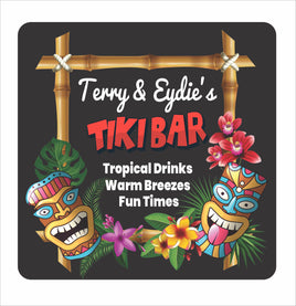 Personalized tiki bar sign with bamboo frame design, colorful tiki masks, tropical flowers, and custom bar name text on a dark background