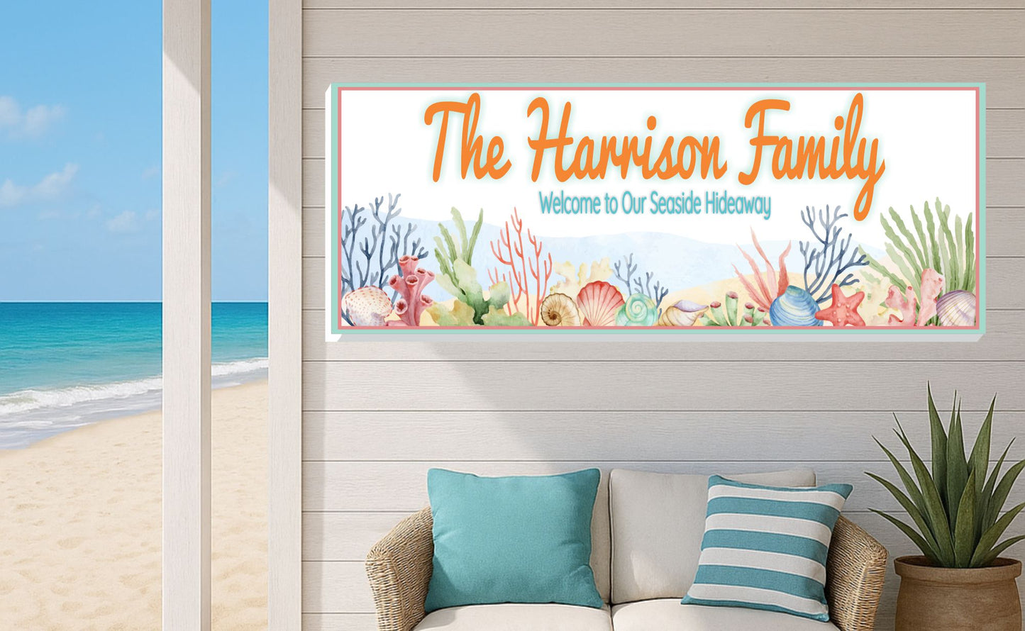 personalized seaside family sign displayed on beach house porch wall overlooking the ocean