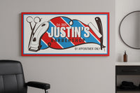 barbershop sign displayed on a wall beside a barber chair in a modern grooming studio