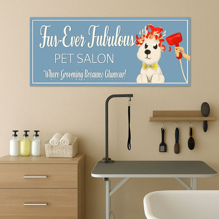 pet grooming salon sign displayed above a grooming table with towels, brushes, and pet care supplies in a professional grooming room