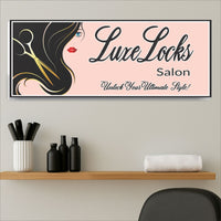 wall sign displayed above a shelf with combs, black bottles, and a folded towel in a modern salon setting