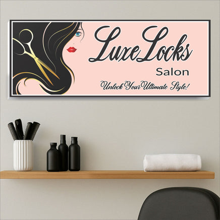 wall sign displayed above a shelf with combs, black bottles, and a folded towel in a modern salon setting