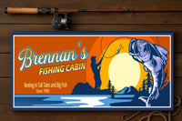 personalized fishing cabin sign on wooden surface with fishing rod and rope