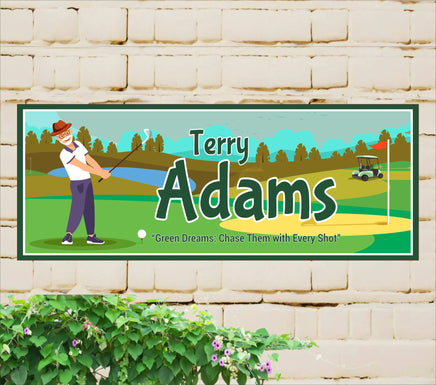 Personalized sign featuring a cartoon-style golfer taking a shot on a green, customizable with names or messages. The golfer is depicted in a dynamic pose, adding a playful and personalized touch to golf decor