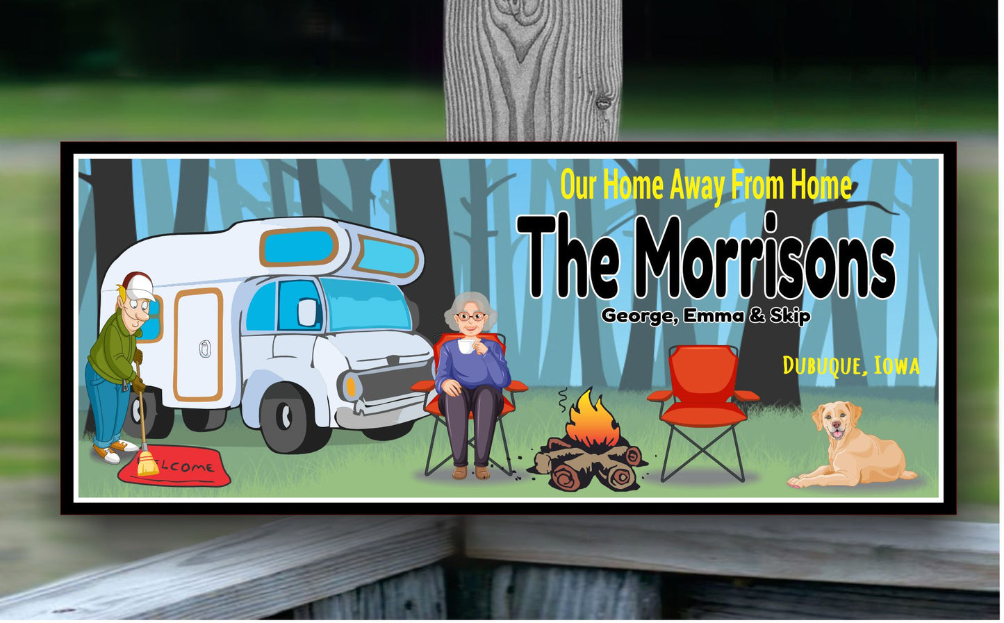 RV campsite decor sign shown near chairs, fire pit, and trees in an outdoor setting