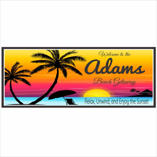 Personalized beach sunset sign with palm trees, ocean waves, lounge chair and umbrella, editable family name and text, printed vinyl mounted on rigid PVC, made in USA