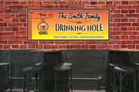 Playful bar sign with cat and beer mug displayed in a home pub or game room