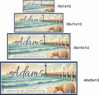coastal retreat personalized beach house sign with lighthouse pier seashells and ocean waves shown in four sizes 