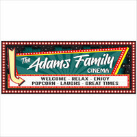 Personalized home theater marquee sign with vintage cinema lights, arrow graphic, and customizable message for a movie room or media room wall