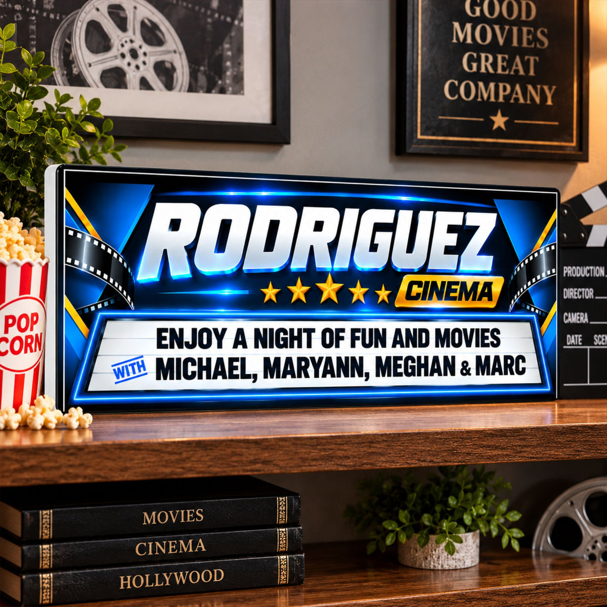 Custom family cinema sign displayed on a home theater shelf with movie-themed décor.