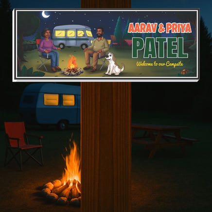 RV campsite sign displayed on camper exterior wall at night with campfire glow
