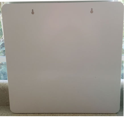 back of sign showing built-in keyhole slots for easy hanging