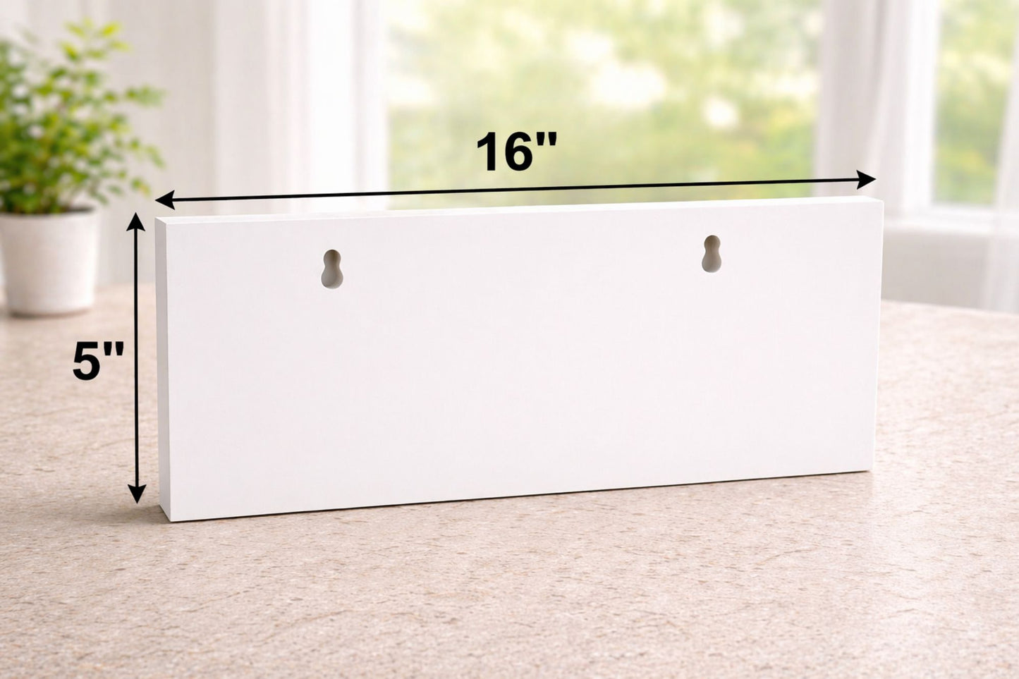 sign back with keyholes showing 16 inch width and 5 inch height arrows on neutral surface