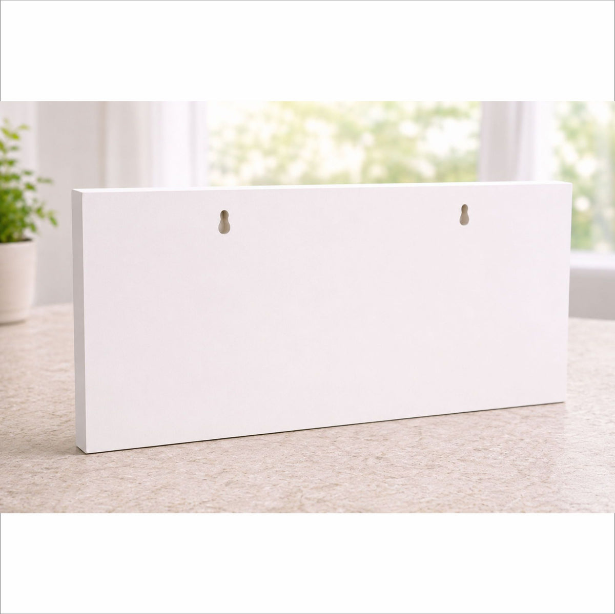 Back of rigid PVC sign showing keyhole mounting slots for easy hanging.