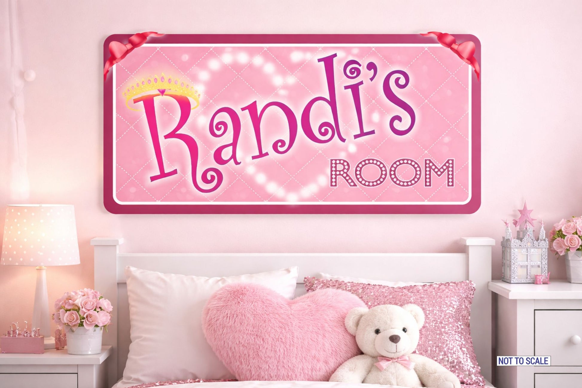 pink princess themed kids bedroom wall sign above bed