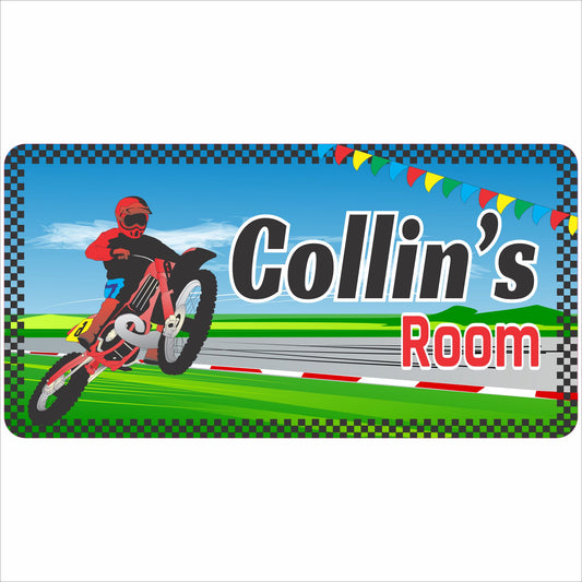 Motocross kids room name sign with dirt bike rider and racing track background