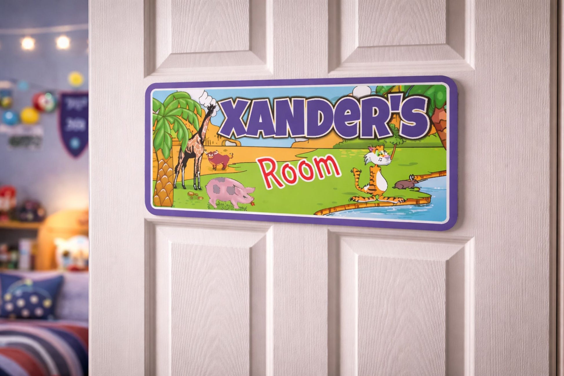 custom jungle theme name sign shown on bedroom door