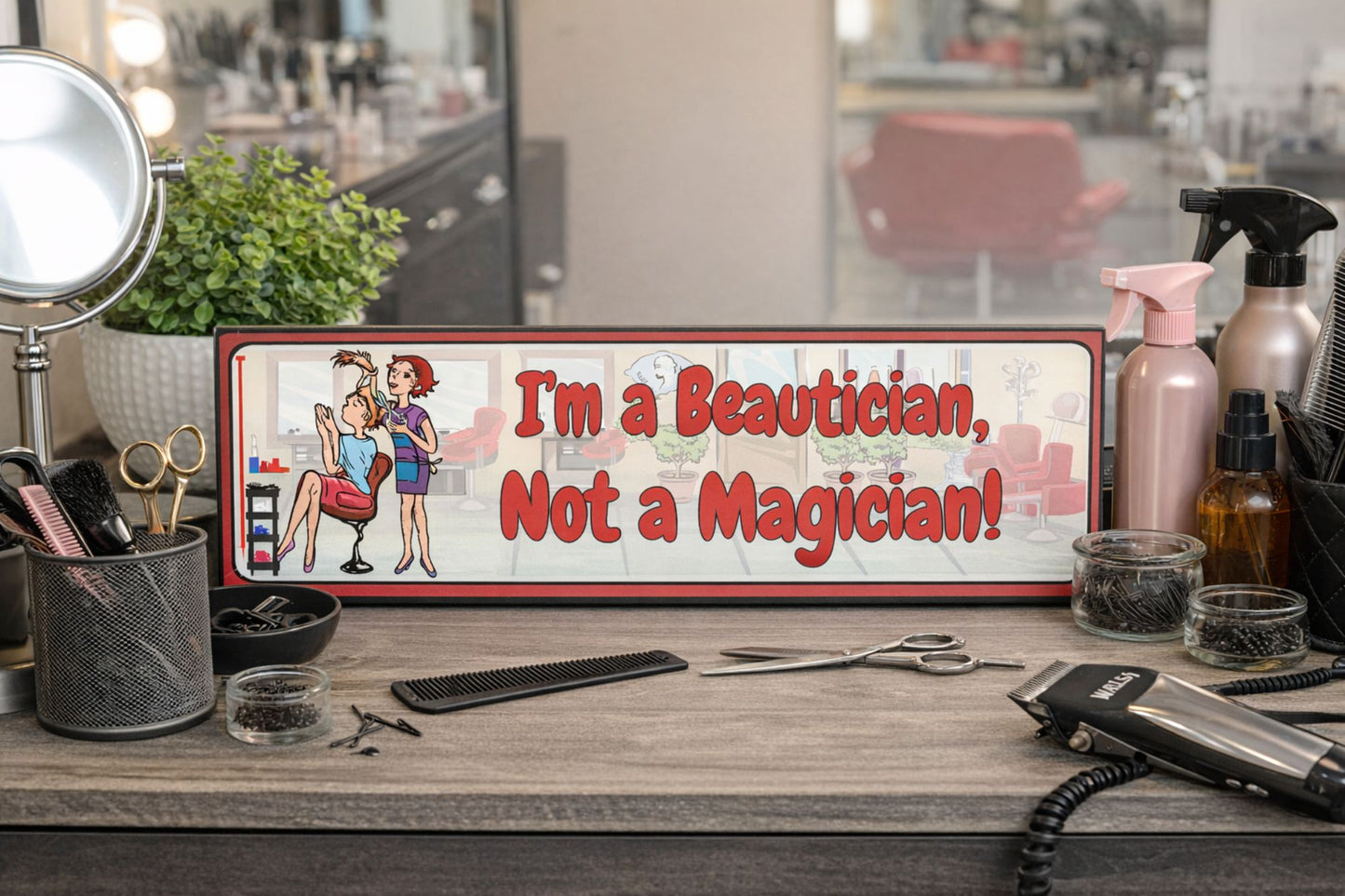 beautician sign displayed on salon workstation with scissors combs hair tools and products humorous hair stylist decor horizontal sign