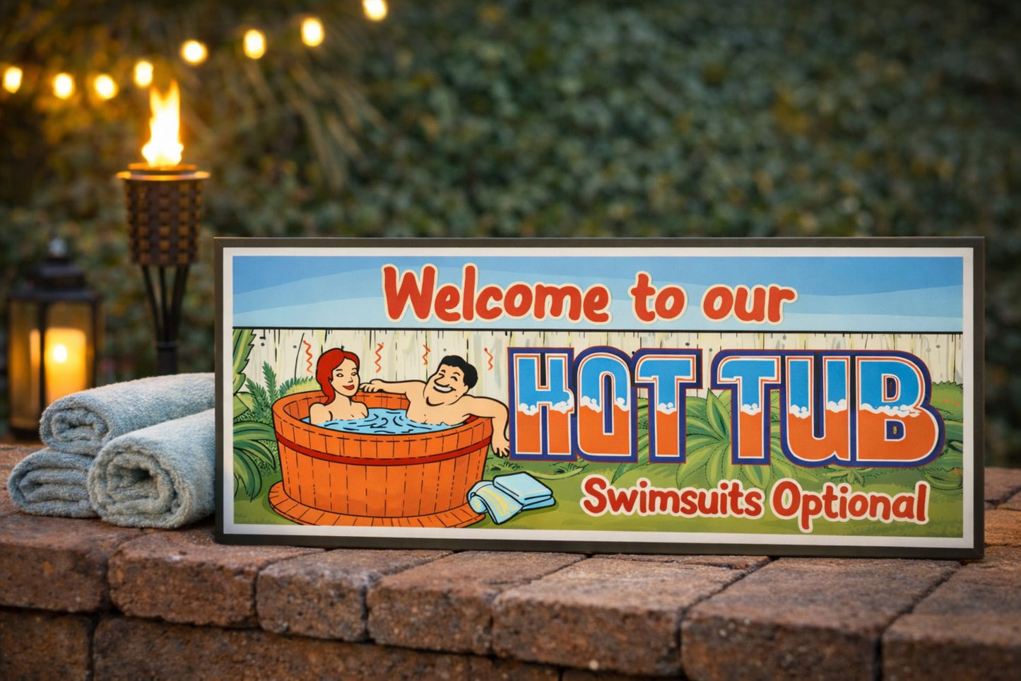 funny hot tub sign lifestyle image with towels and outdoor lighting