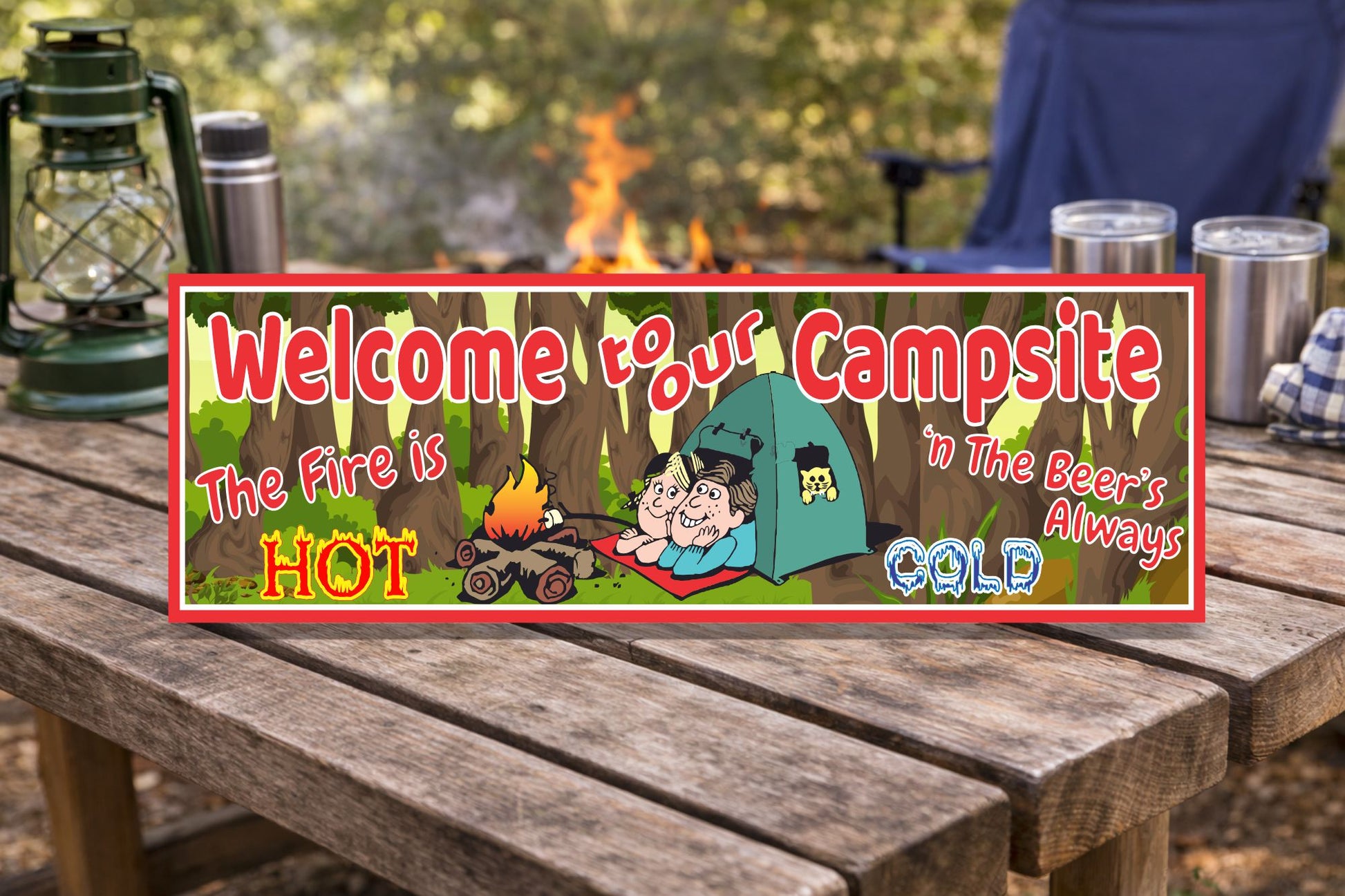 campsite funny camping sign displayed on rustic picnic table near campfire and camping gear