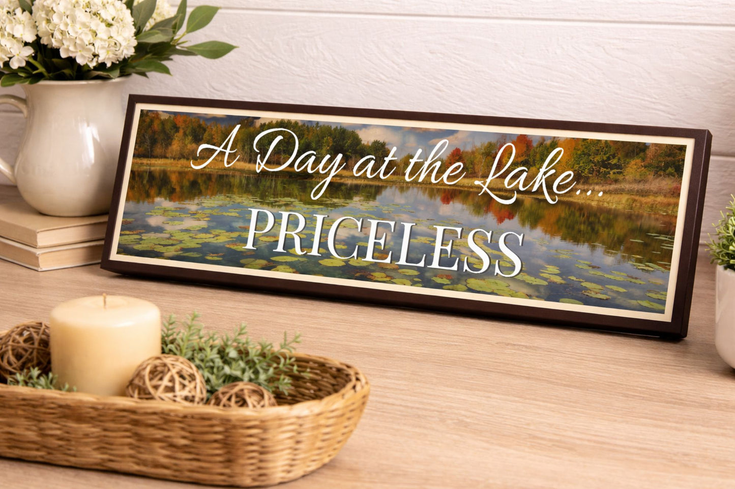 16x5 lake decor sign displayed on table with candle and basket small space styling