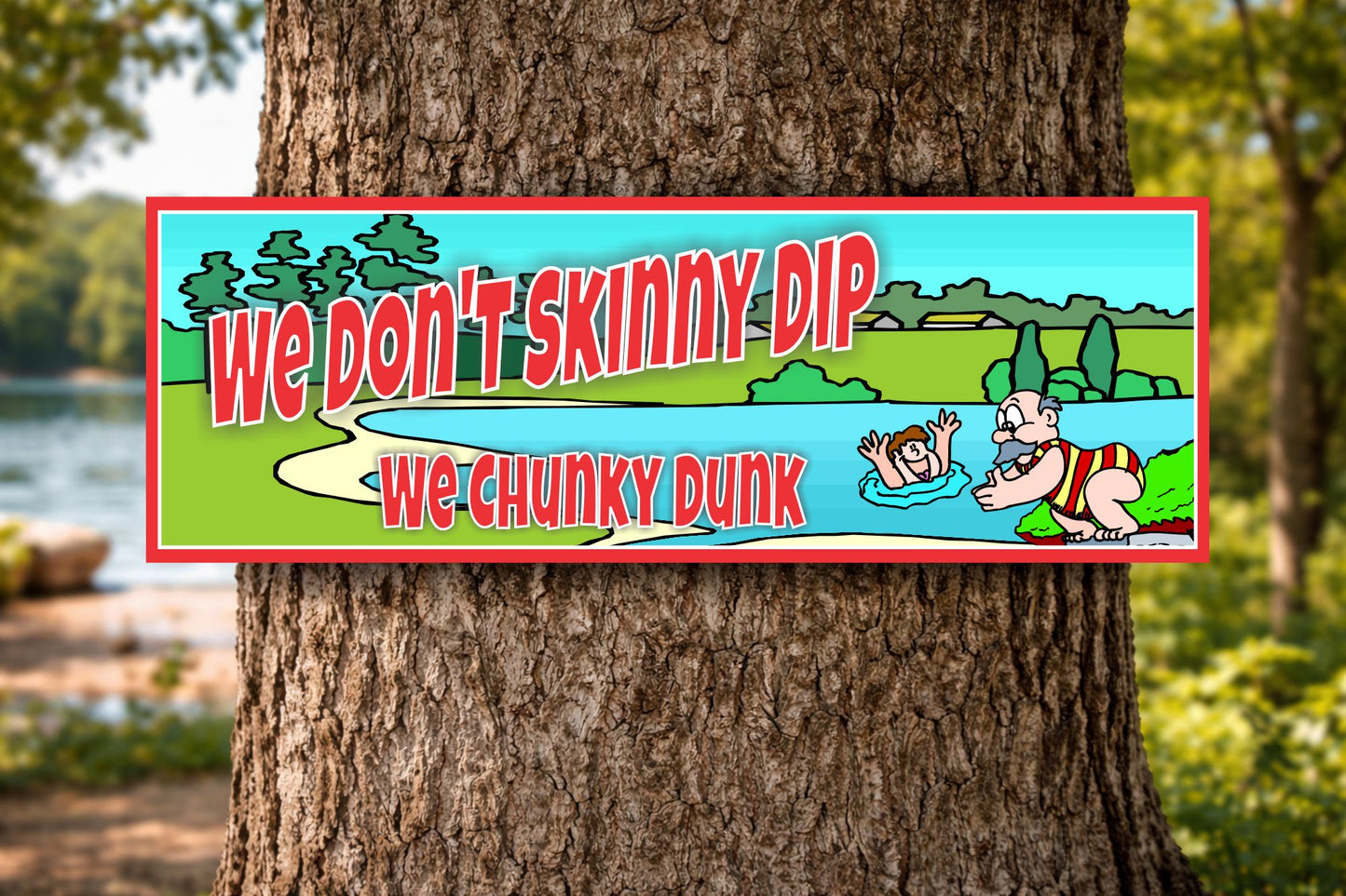 Humorous lake sign mounted on tree in outdoor setting