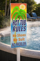 hot tub rules sign displayed beside bubbling spa
