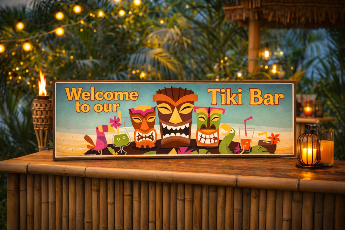 Welcome to Our Tiki Bar sign displayed sitting on a bamboo tiki bar countertop with tropical plants, string lights, and cocktails